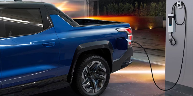 Chevrolet Silverado-EV Charging at Station Img